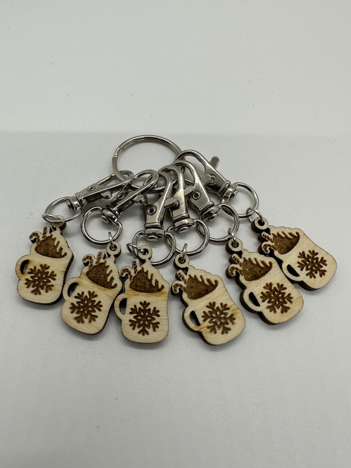 Keychain with wooden mug charms on a white background