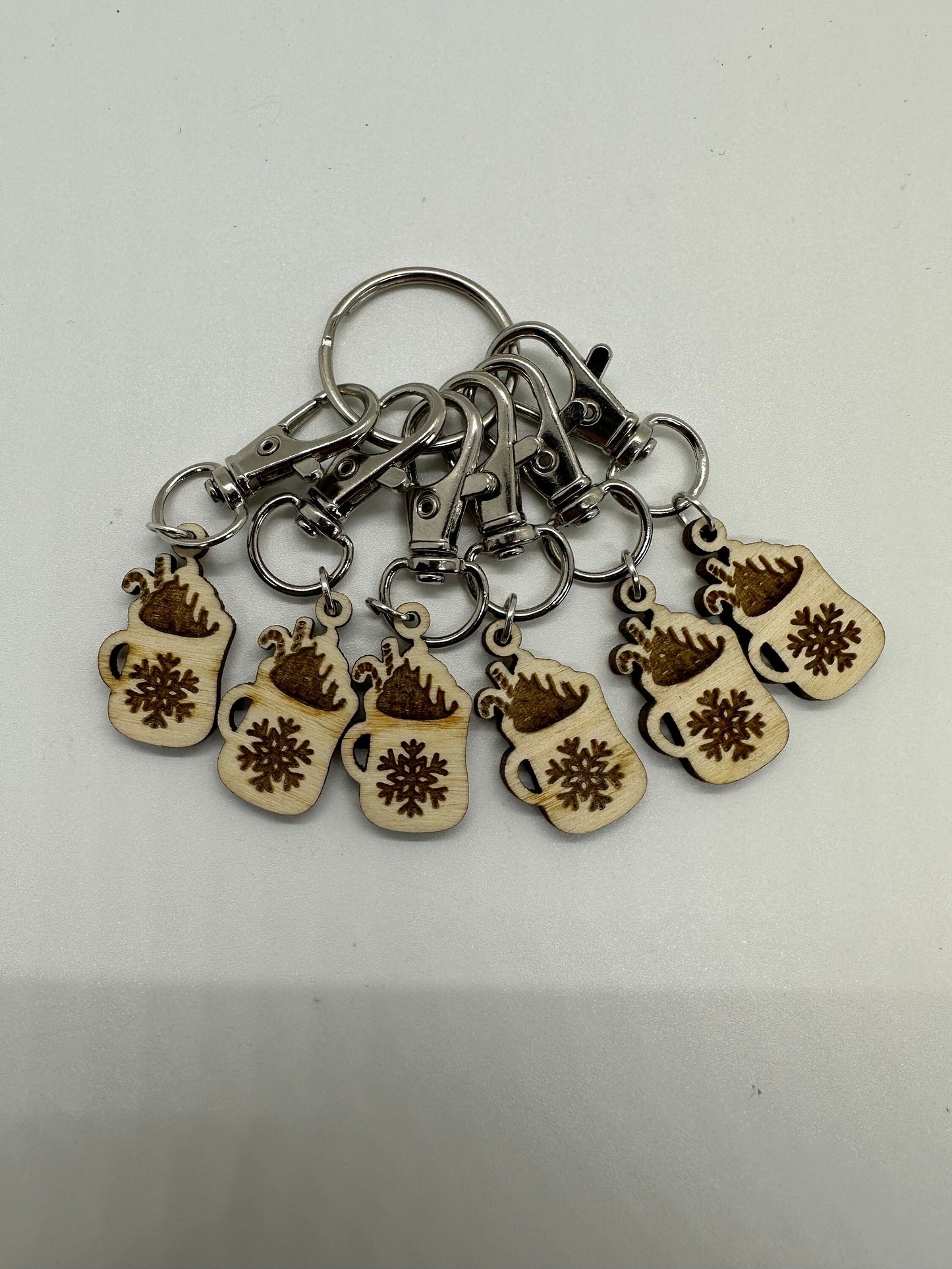 Keychain with wooden mug charms on a white background